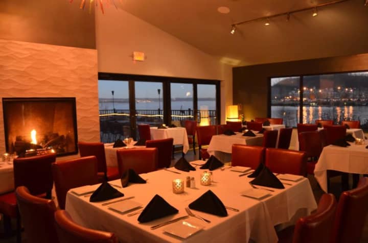 The dining room -- complete with roaring fire -- at Catch on the Hudson in Haverstraw.