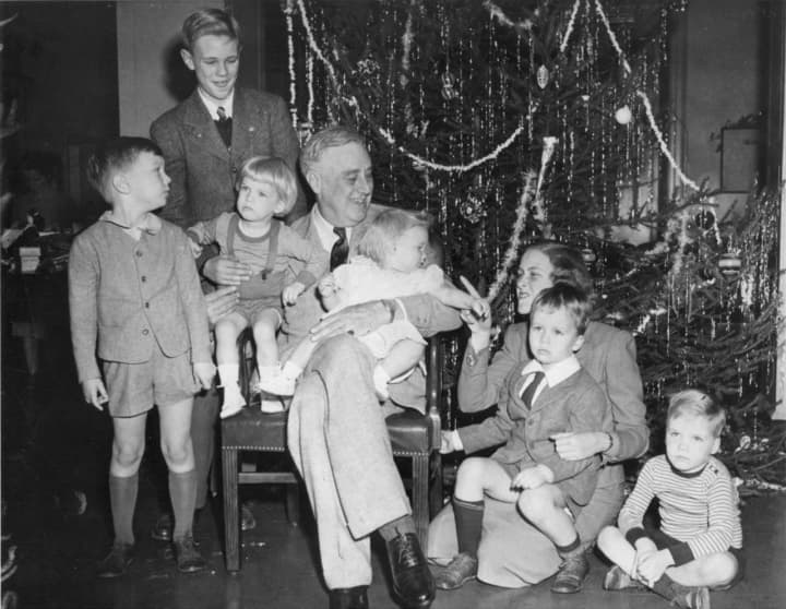 President Roosevelt celebrating Christmas with his grandchildren in the Franklin D. Roosevelt Library Dec. 24, 1943.