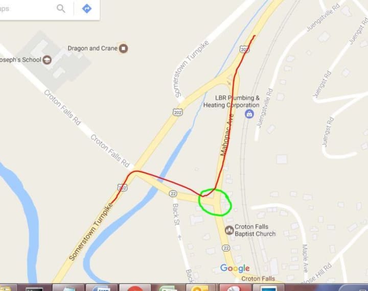 The photo shows the travel of traffic (red line) and the problem intersection for northbound traffic (green circle).