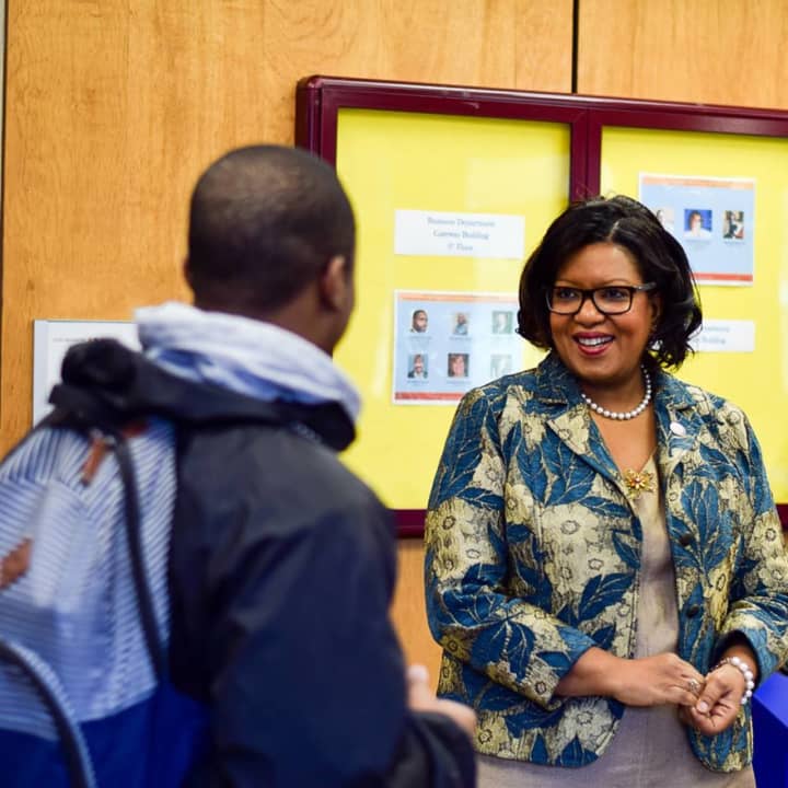 President, Belinda Miles greets a student at Westchester Community College.