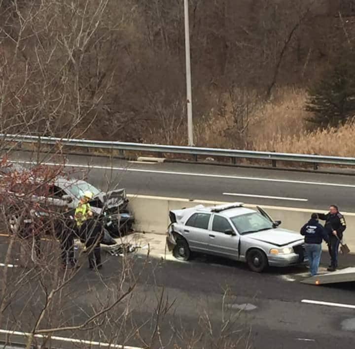 A Connecticut state trooper was rear-ended while helping a stranded vehicle on Route 7.