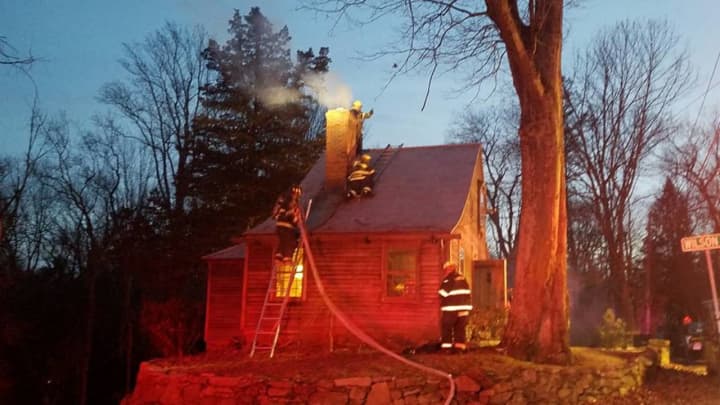 Easton volunteer firefighters respond to a chimney fire on Saturday.