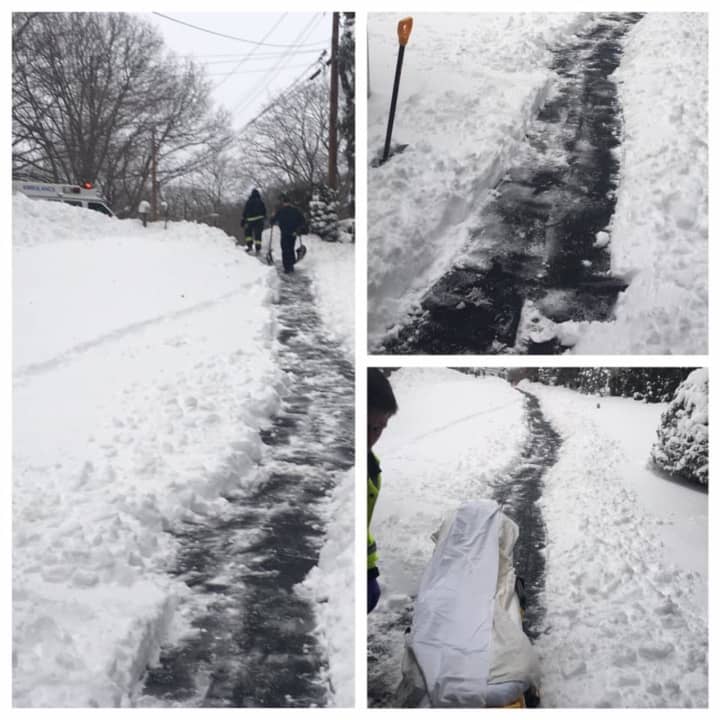 A Fairfield police officer and firefighters dug out an elderly man&#x27;s walkway while they made a medical emergency call Thursday.