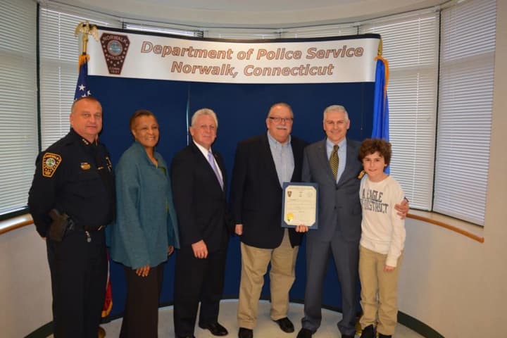 Detective Patrick English (second from right) was recently promoted within the Norwalk Police Department.