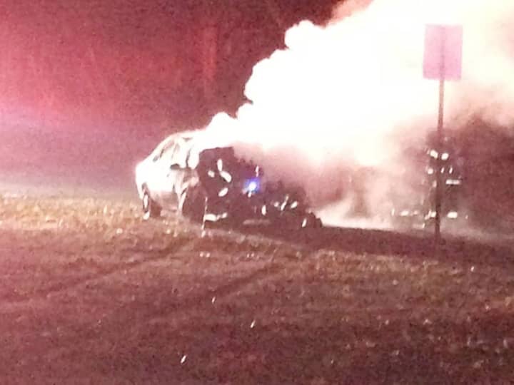 A car fire closed down West Maple Avenue for more than hour as firefighters worked to douse the flames.