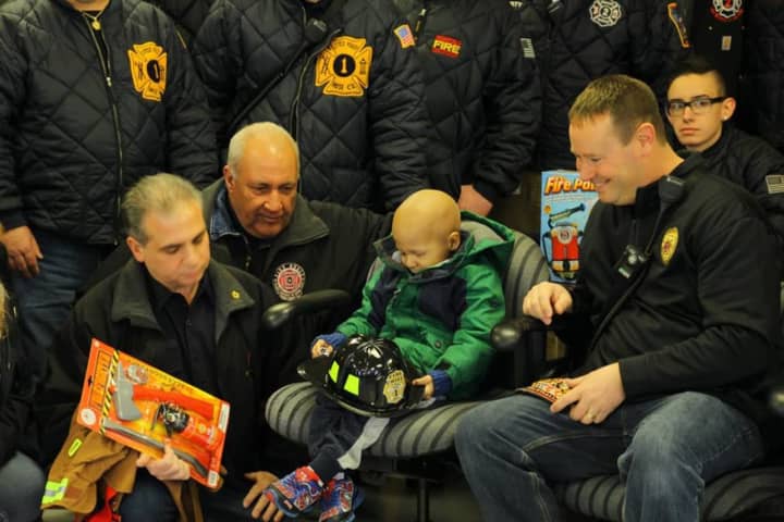 Lil Ryu of Little Ferry, 5, received his very own fire hat, thanks to Bergen County Pink Heals and local departments.
