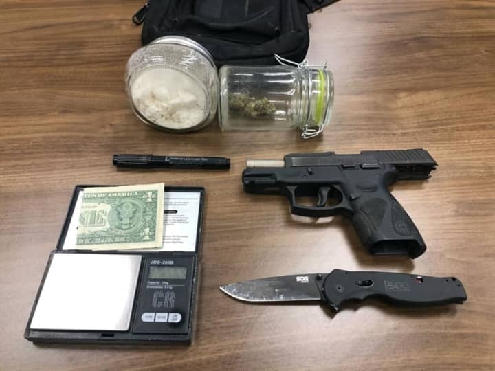 Police in Dalton busted a man with drugs and an illegal weapon