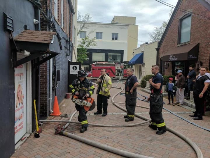 Greenwich firefighters respond to a small fire Sunday on Greenwich Avenue.