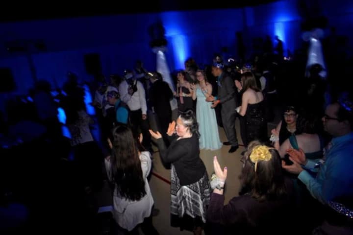 Two Danbury High students are raising money to hold a unified prom for mainstream and nonmainstream students.
