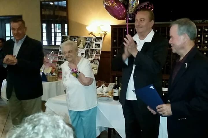 Fannie Moscato celebrates her 100th birthday with Rockland County Executive Ed Day and her friends and family.