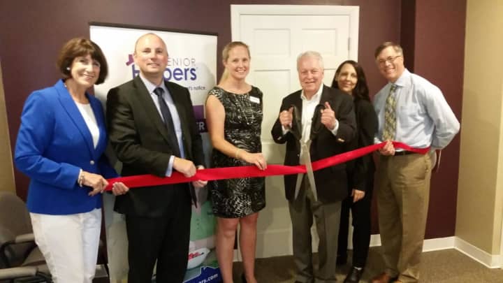 Fairfield Chamber of Commerce President Beverly Balaz, co-owners Joel and Katie Vanovitch, First Selectman Michael Tetreau, General Manager Lynn Lemay and Fairfield Director of Community and Economic Development Mark Barnhart cut the ribbon.