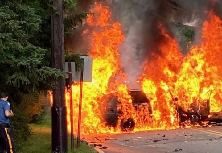 The SUVs burst into flames following the Paramus Road crash.