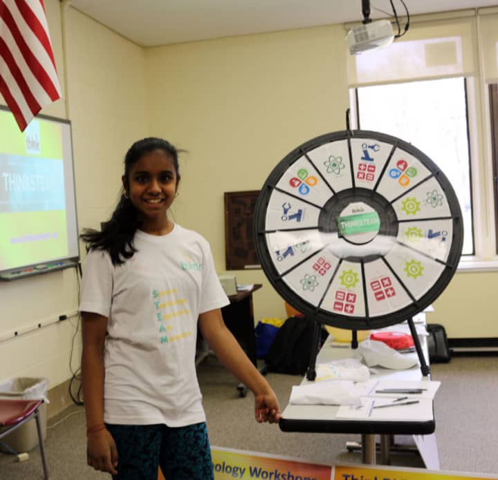 A student shows her project at the March 5 STEMFest.