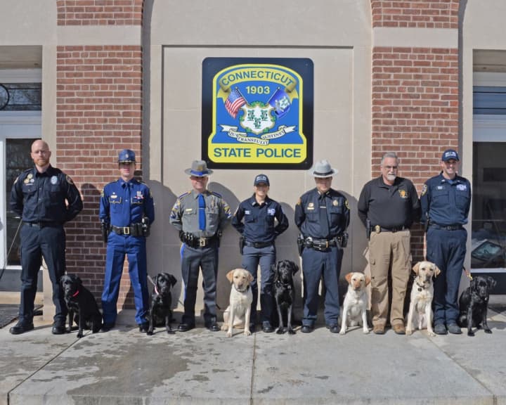 Graduating members from the Connecticut State Police K-9 Unit specialized school.