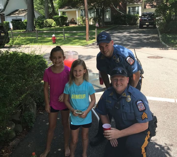 Park Ridge police officers stopped to support a local lemonade stand over the weekend.