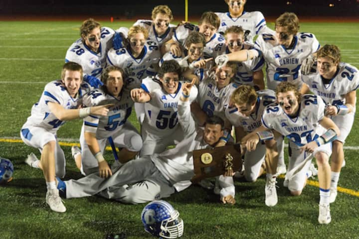 The 2015 Darien High School football team is shown here. The school&#x27;s football stadium will be outfitted with permanent field lights thanks to a Darien Athletic Foundation.