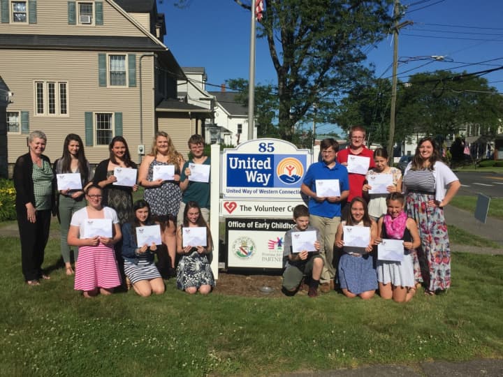 Twenty-three local youth were honored for their service with Youth Volunteer Corps of Western Connecticut. See end of story for identifications.
