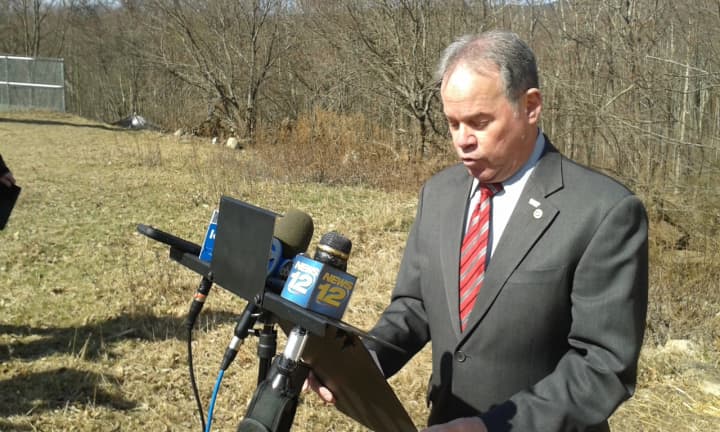 Rockland County Executive Ed Day Friday called on Ramapo Supervisor Christopher St. Lawrence to step down from two county posts pending the resolution of federal security fraud charges against him.