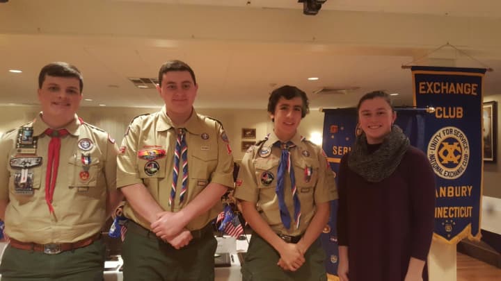 From left, Scouts Thomas Haessler, Sean Roberts, Ryan Fox and Lauren Guiry are honored at the Danbury Exchange Club&#x27;s Eagle Scout/Gold Award Program.