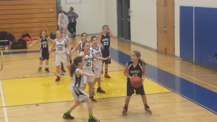 The Ramsey girls varsity basketball team invited a travel team of fourth grade girls to their game Tuesday night.