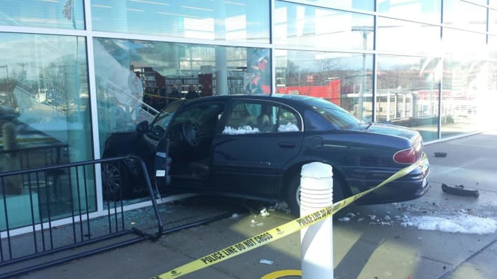 A car drives into the lobby of Greenburgh Public Library at 300 Tarrytown Road early Friday afternoon. No one was reported hurt.