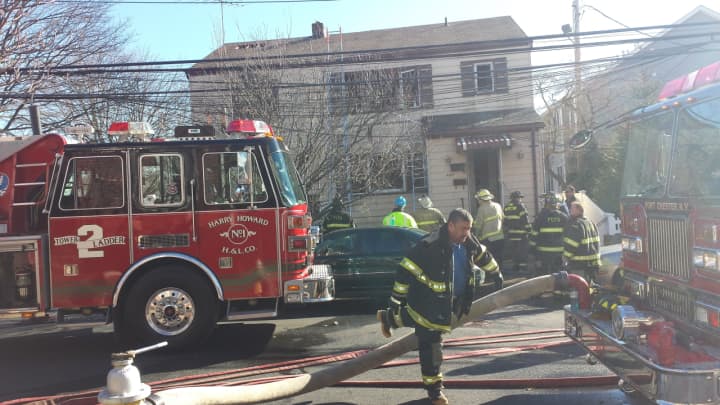 Port Chester firefighters battle a blaze in the village in March.