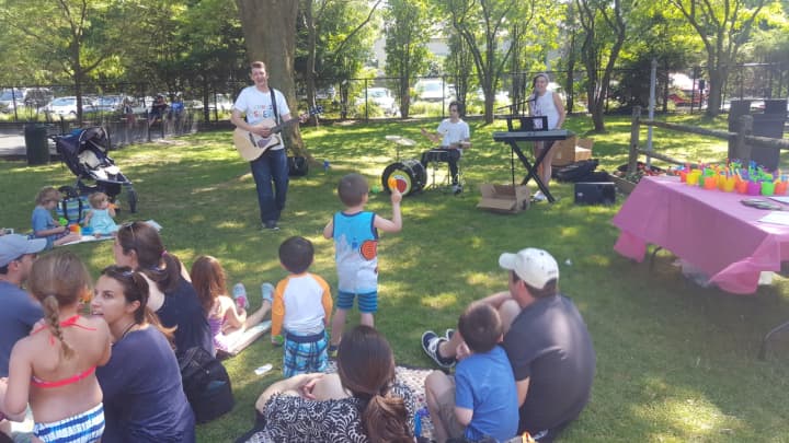 Families attended a Songs for Seeds concert at the Scarsdale Pool.