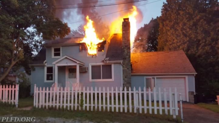 Putnam Lake firefighters battled an early morning blaze on Hermitage Road.