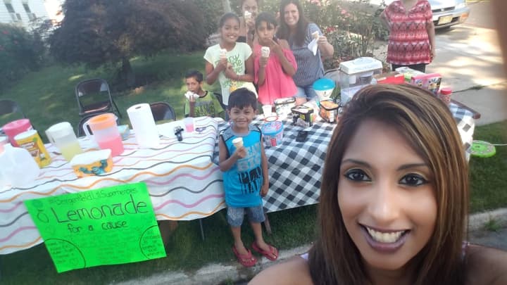 The DeSottos at their School Street lemonade stand Friday.