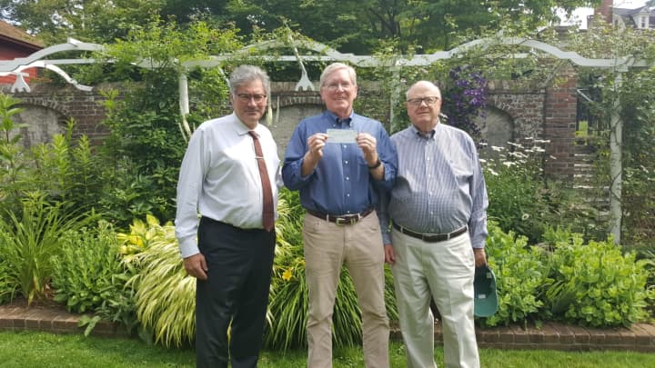 Robert Herber, president of the Rotary Club of Ridgefield; Charlie Taney, executive director of the NRVT; Joel Third, vice president of the Rotary Club of Ridgefield. Pictured at the Keeler Tavern garden.