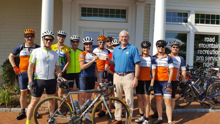 Jacqui Dowd, president of the Ridgefield Bicycle Sport Club; Charlie Taney, executive director of the NRVT; and members of the Ridgefield Bicycle Sport Club.