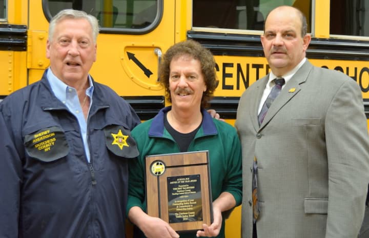 Dutchess County Executive Marc Molinaro that Vincent Valentino, center, of the Pawling Central School District, has been named the winner of the 17th annual Dutchess County School Bus Driver of the Year.