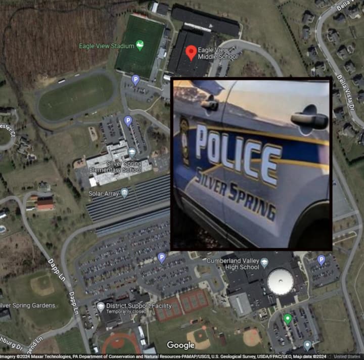 A&nbsp;Silver Spring Township Police Department vehicle and a map showing&nbsp;Eagle View Middle School where the loaded semi-automatic gun was found in a boy backpack, authorities say.