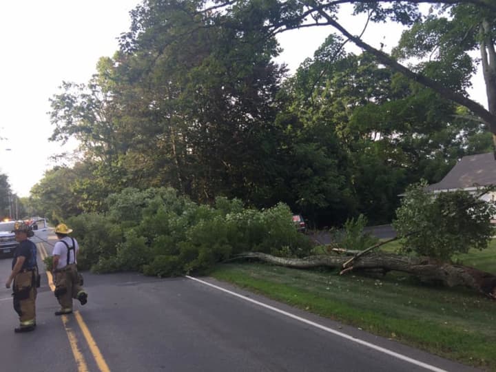 The Huntington Fire Co.  responds to a tree down — along with wires — on Huntington Street.