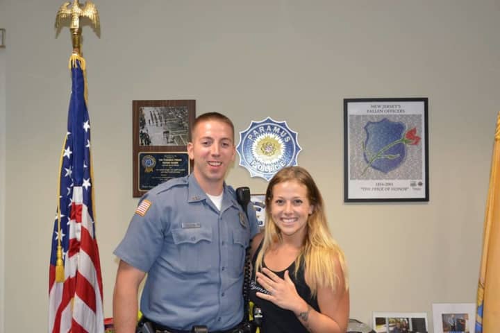 Paramus Police Officer Jon Henderson with Kimberly Garcia.