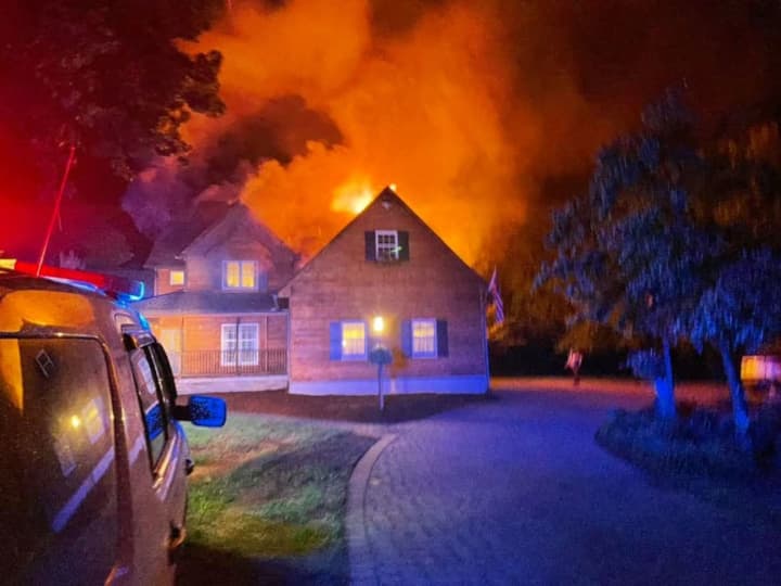 Fire crews were quick to douse a roaring blaze that broke out in the attached garage of a Sussex County home before dawn Wednesday.