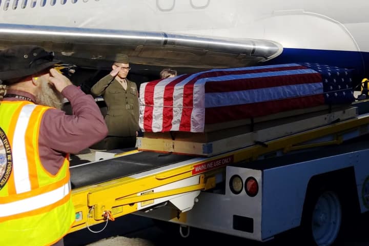 The remains of Marine Cpl. Walter Critchley, of New Rochelle, were brought to Arlington National Cemetary, where he was buried with full military honors.
