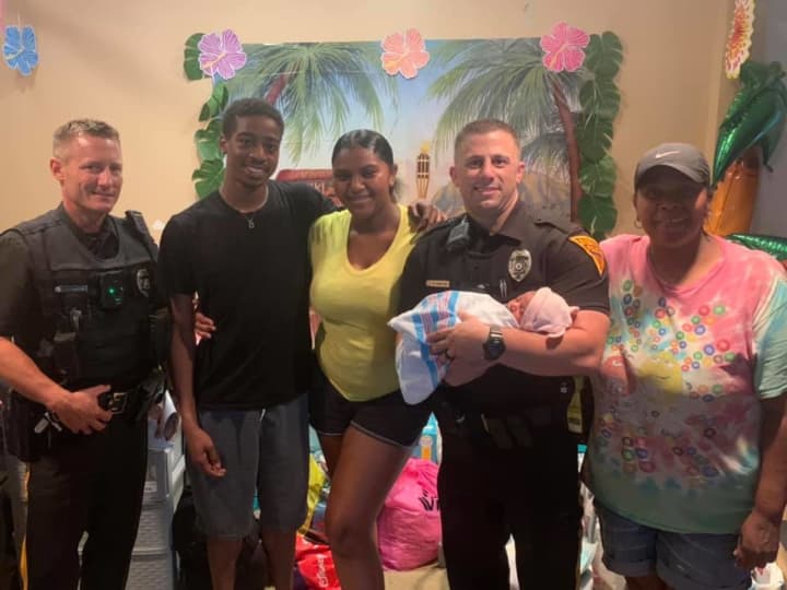 Officers Addezio and Padulese, Dad (Imani), Mom (Dy&#x27;Shanye), and Grandmother.