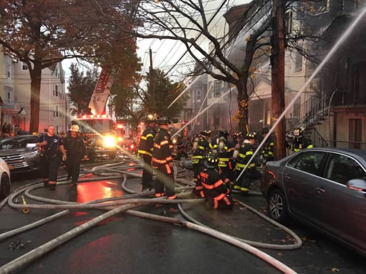 More than 50 people have been displaced in a four-alarm fire.