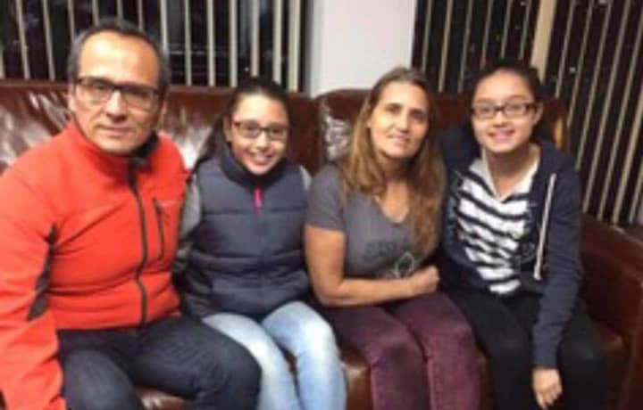 Miriam Martinez-Lemus, a Stamford resident who is facing deportation to Guatemala, with her husband, Raphael Benavides, and their daughters.