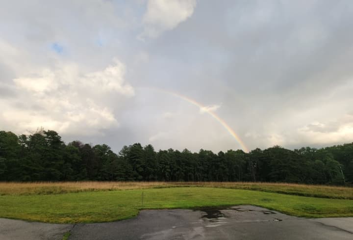 A rainbow appears late Monday afternoon, Aug. 23 in Suffolk County after Hurricane turned Tropical Storm turned Tropical Depression Henri pushed off to the east following three days of heavy rainfall in the region.