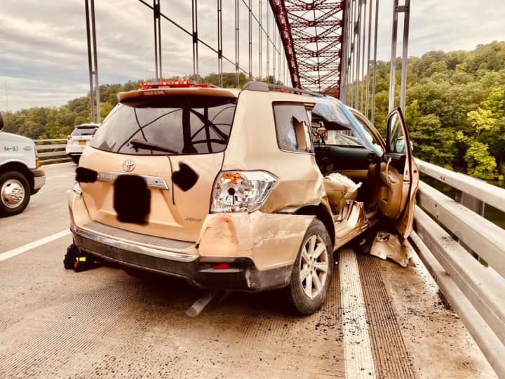 Two people were trapped in an SUV during a three-vehicle crash on the Taconic Parkway.