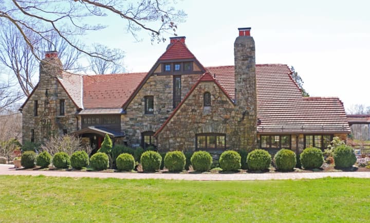 This English stone manor residence designed by famed architect Grosvenor Atterbury in Ridgefield is now on the market.