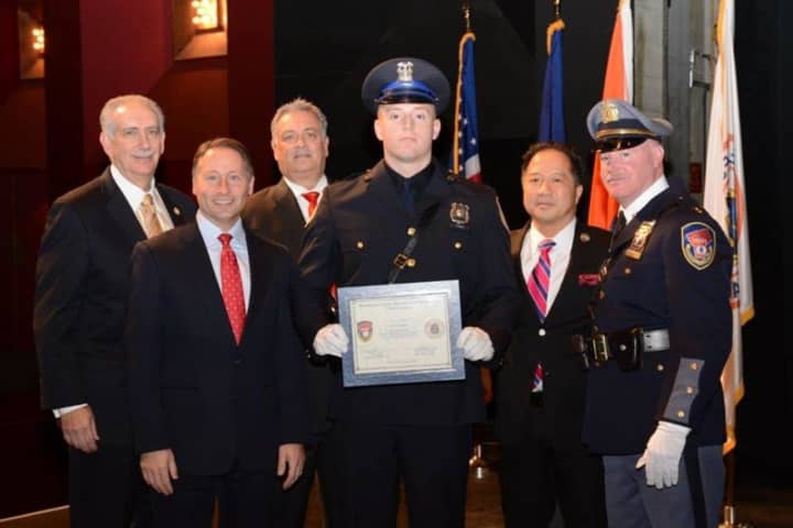 John Hodges (c) graduates from the Westchester County Police Academy. His father, John Hodges (far right) is a Westchester County Police Officer.