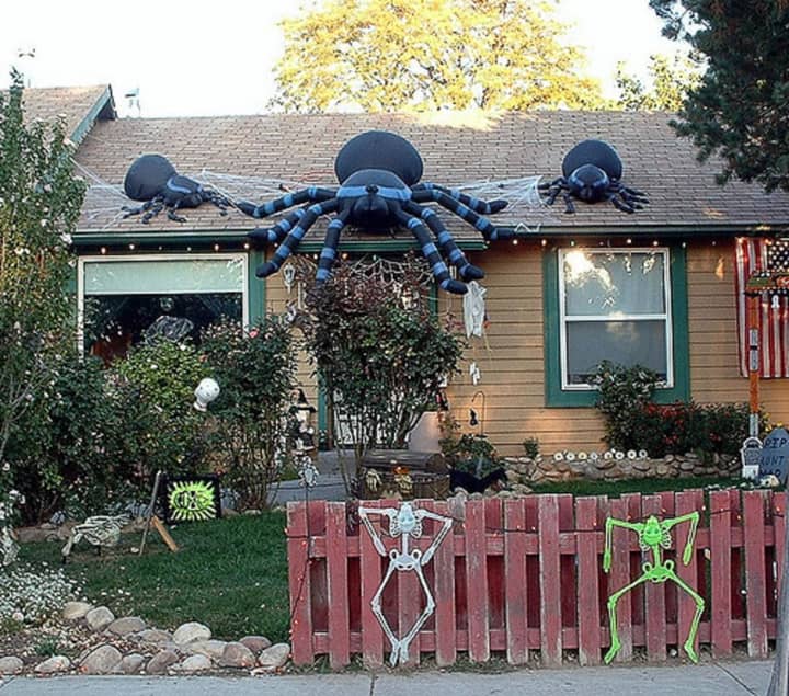 Many people decorate their homes on Halloween.