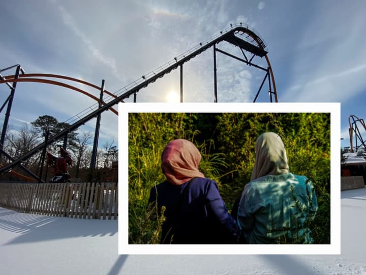 Two hijabis (woman wearing head-scarves) and The Jersey Devil Coaster at Six Flags Great Adventure in Jackson Township on Feb. 2, 2022.