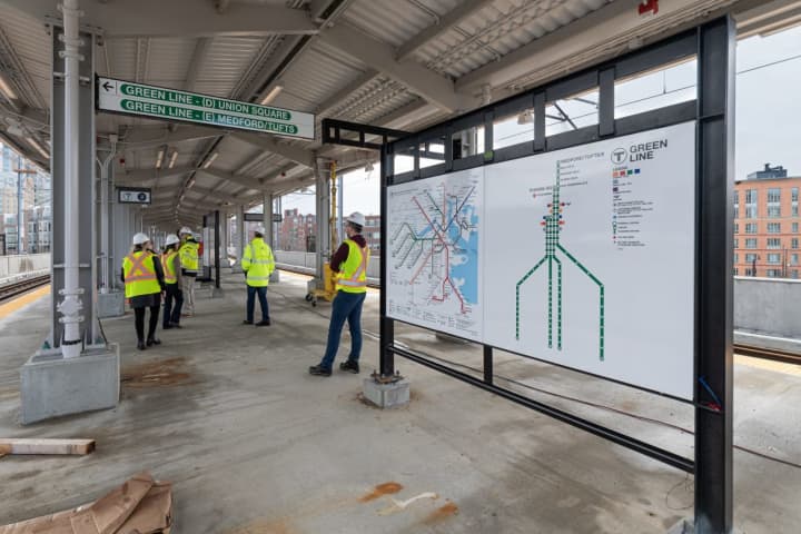 Green Line Extension team members conducting a walk through of the new Lechmere and Union Square stations in March.