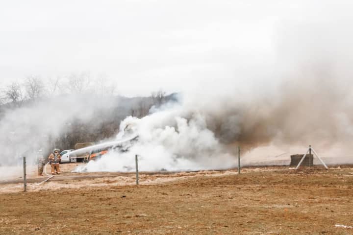 A trailer full of hay caught fire in Warren County late Tuesday morning, causing potentially smoky conditions for local drivers, authorities said.