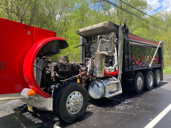A dump truck caught fire and shut down Route 515 in Sussex County Tuesday afternoon, police said.