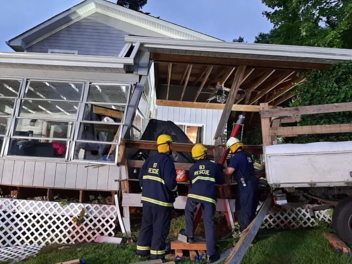 Numerous emergency crews rushed to the scene of a truck that slammed into a home in Warren County.